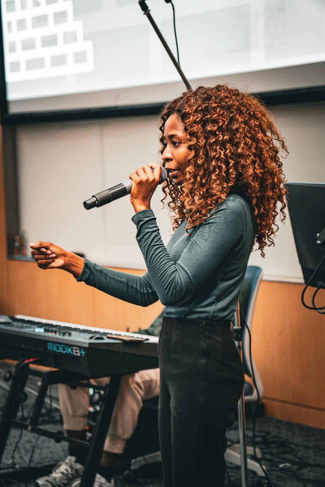 Vocalist performing with a keyboard player behind