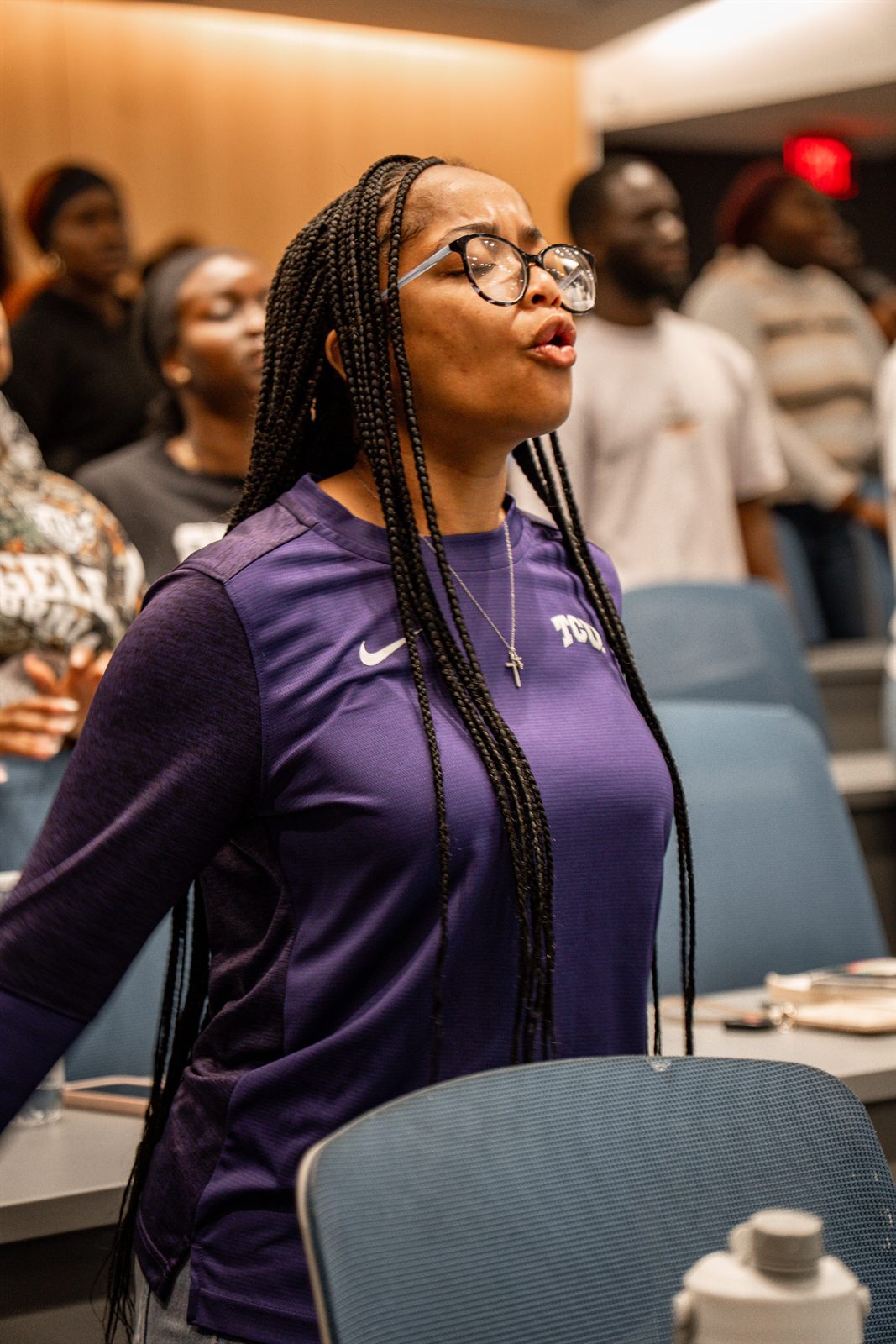 Attendee singing during the gathering